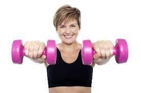 older woman lifting weights